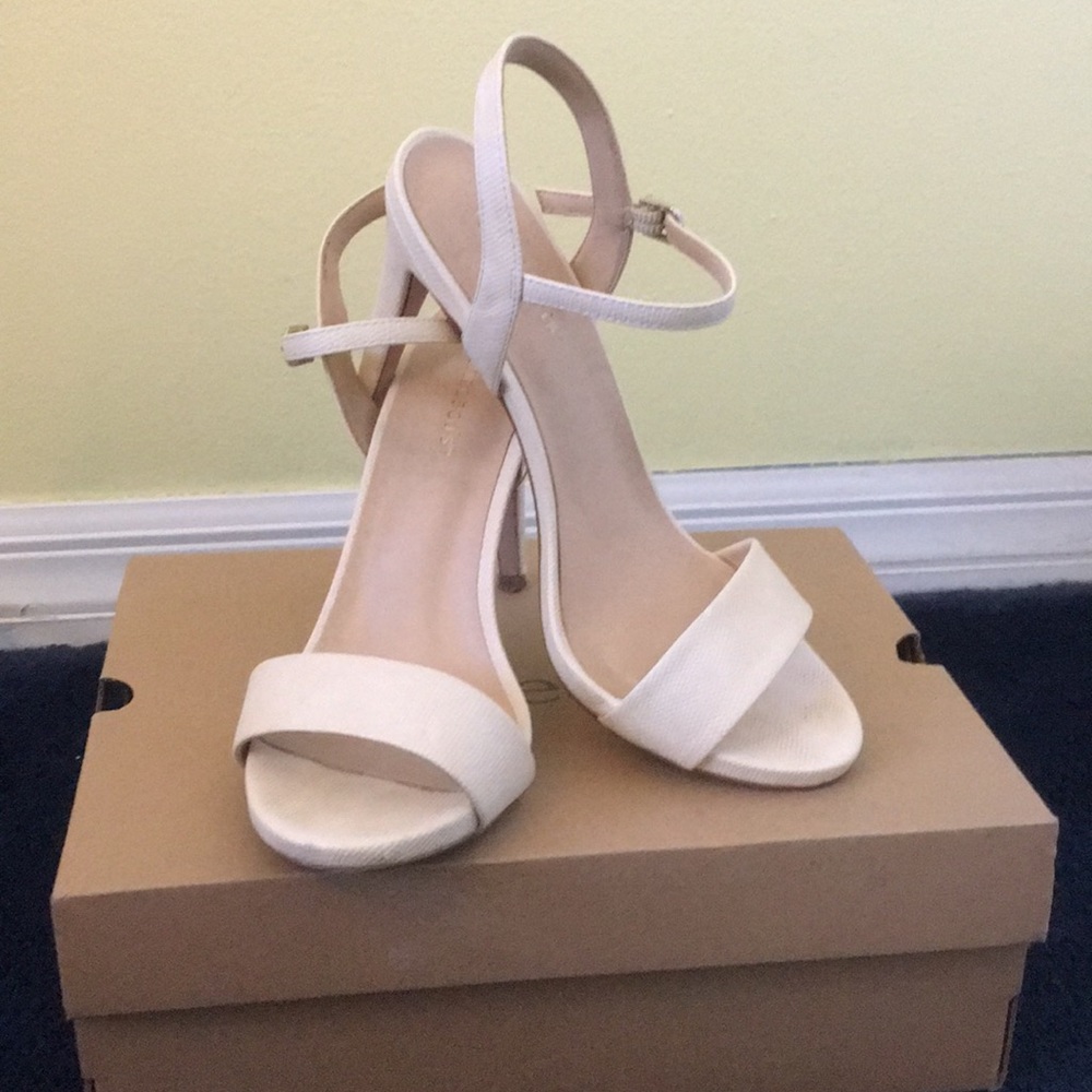 Caris•Nude Snake Heeled Sandals.